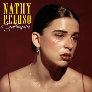 Écouter "Estoy Triste" de NATHY PELUSO
