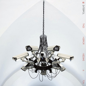Cover artwork for This Mirror Weighs a Ton by Interpol